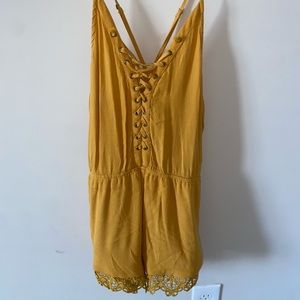 yellow romper.